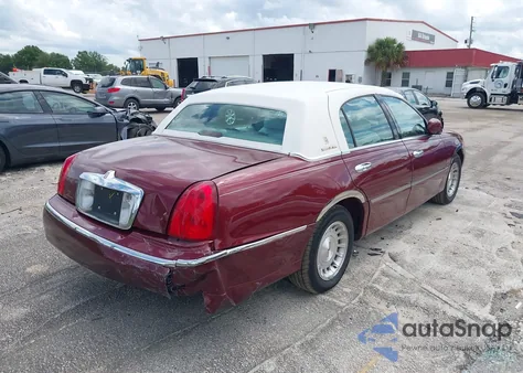 1999 Lincoln Town Car Executive from USA, damaged, VIN 1LNHM81W1XY639598